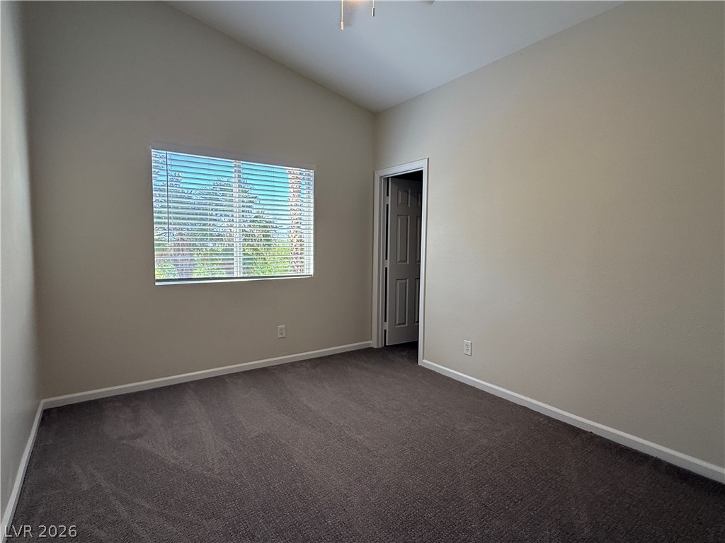 1908 Thunder Ridge Circle Henderson, NV 89012 - Photo 17 of 28 A well-lit bedroom offering a blank canvas for personalization.