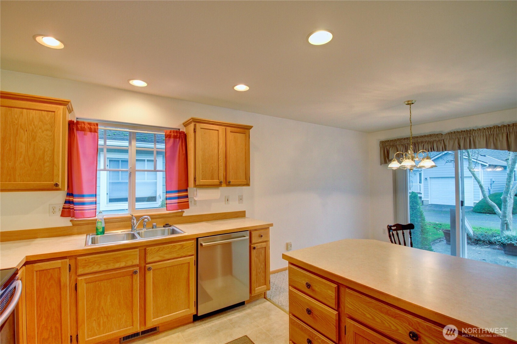 1072 Sinclair Way, Unit 56 Burlington, WA 98233 - Photo 14 of 29 a kitchen with a sink and a window