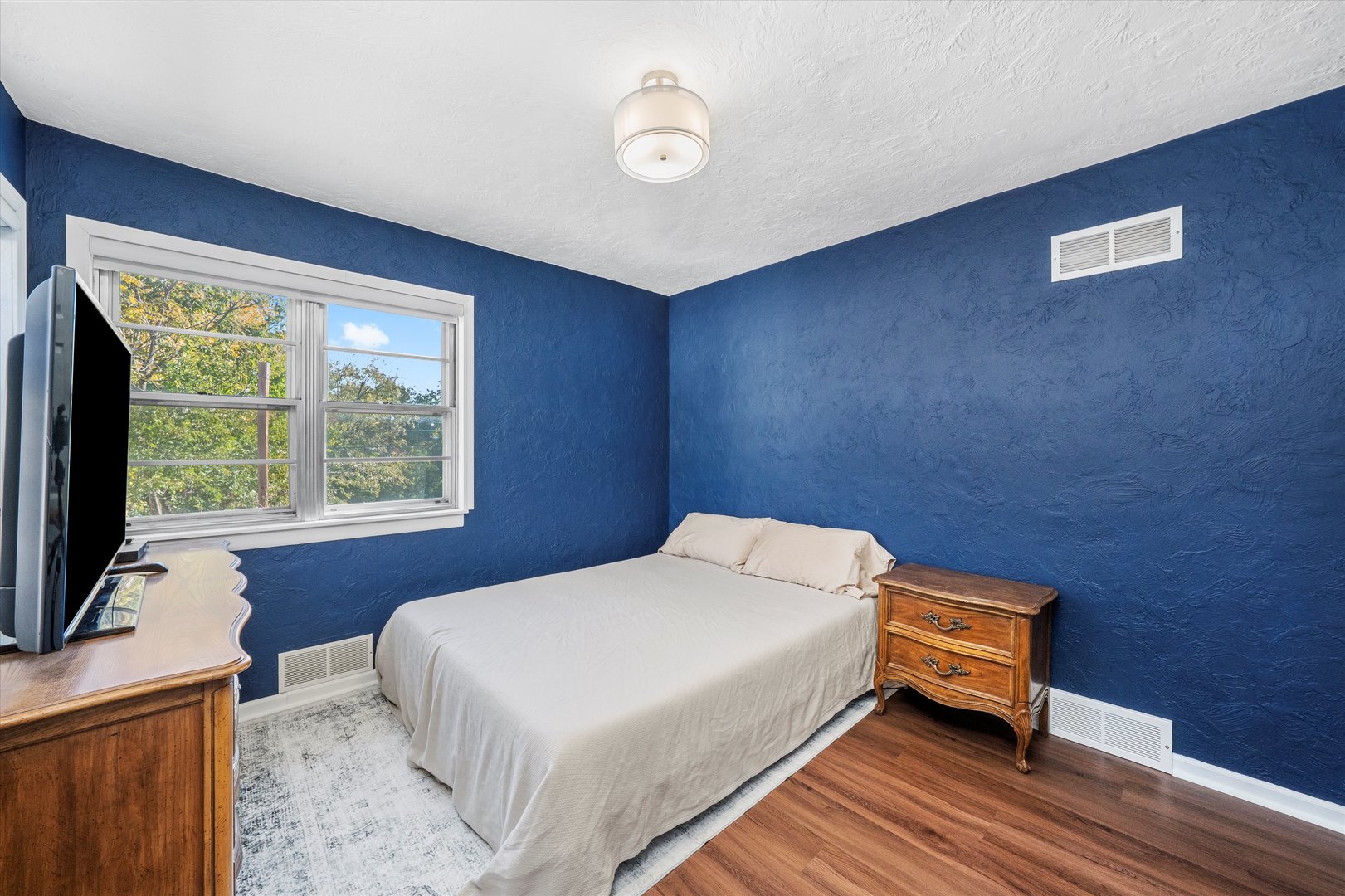 1212 Grandview Avenue Lockport, IL 60441 - Photo 15 of 38 a bedroom with a bed and a window