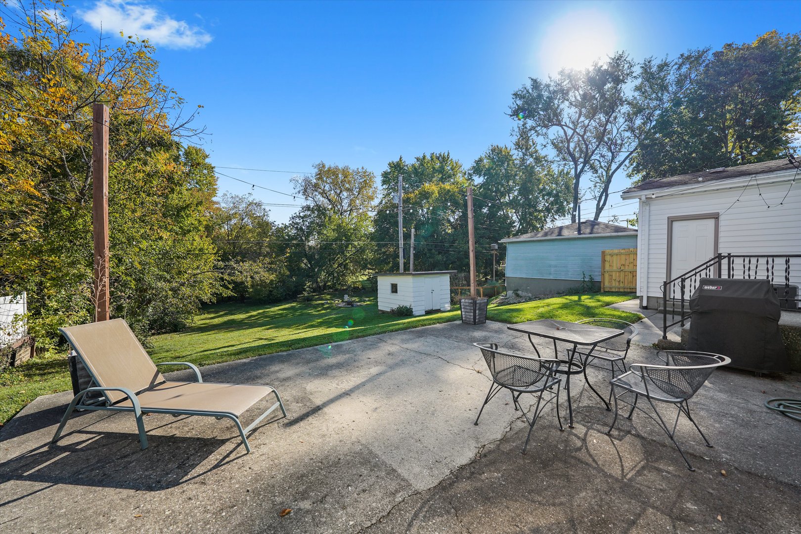 1212 Grandview Avenue Lockport, IL 60441 - Photo 30 of 38 a view of a chair and table in backyard of the house
