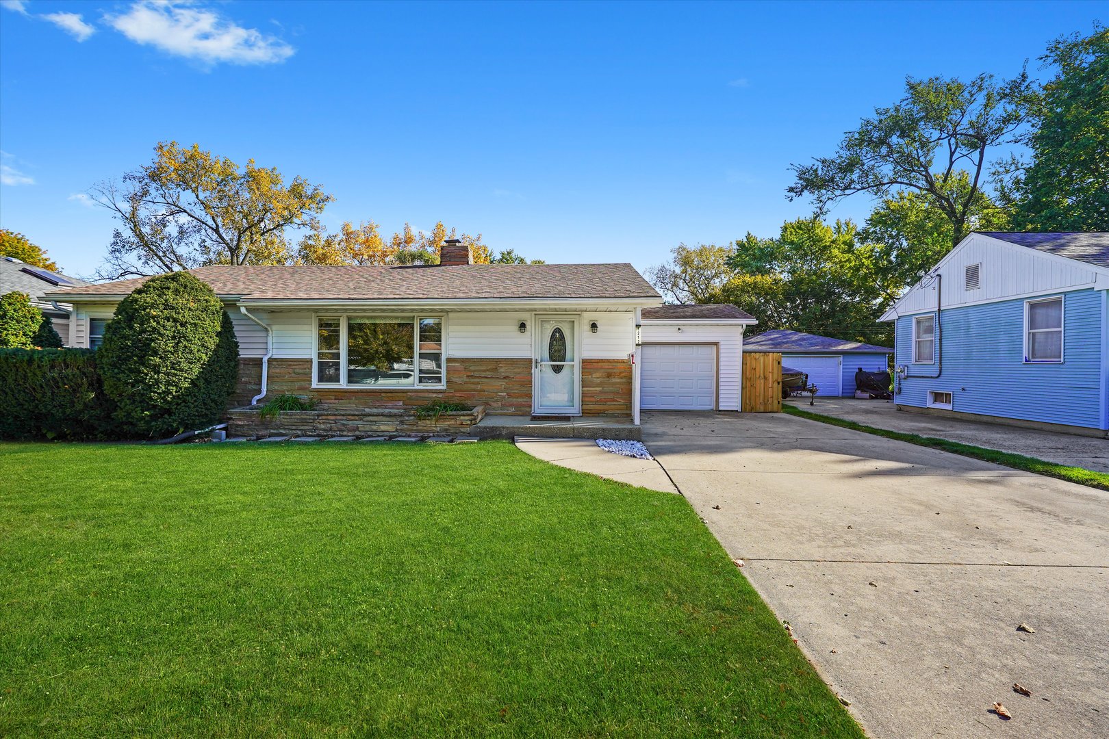1212 Grandview Avenue Lockport, IL 60441 - Photo 38 of 38 a front view of a house with a garden and yard