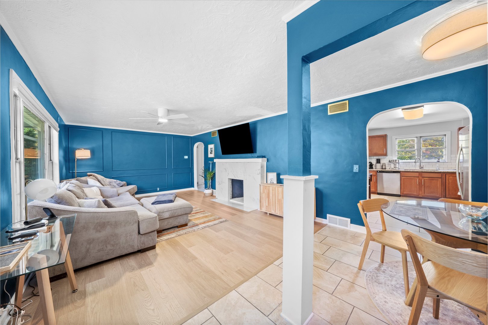 1212 Grandview Avenue Lockport, IL 60441 - Photo 5 of 38 a living room with furniture a fireplace and a large window