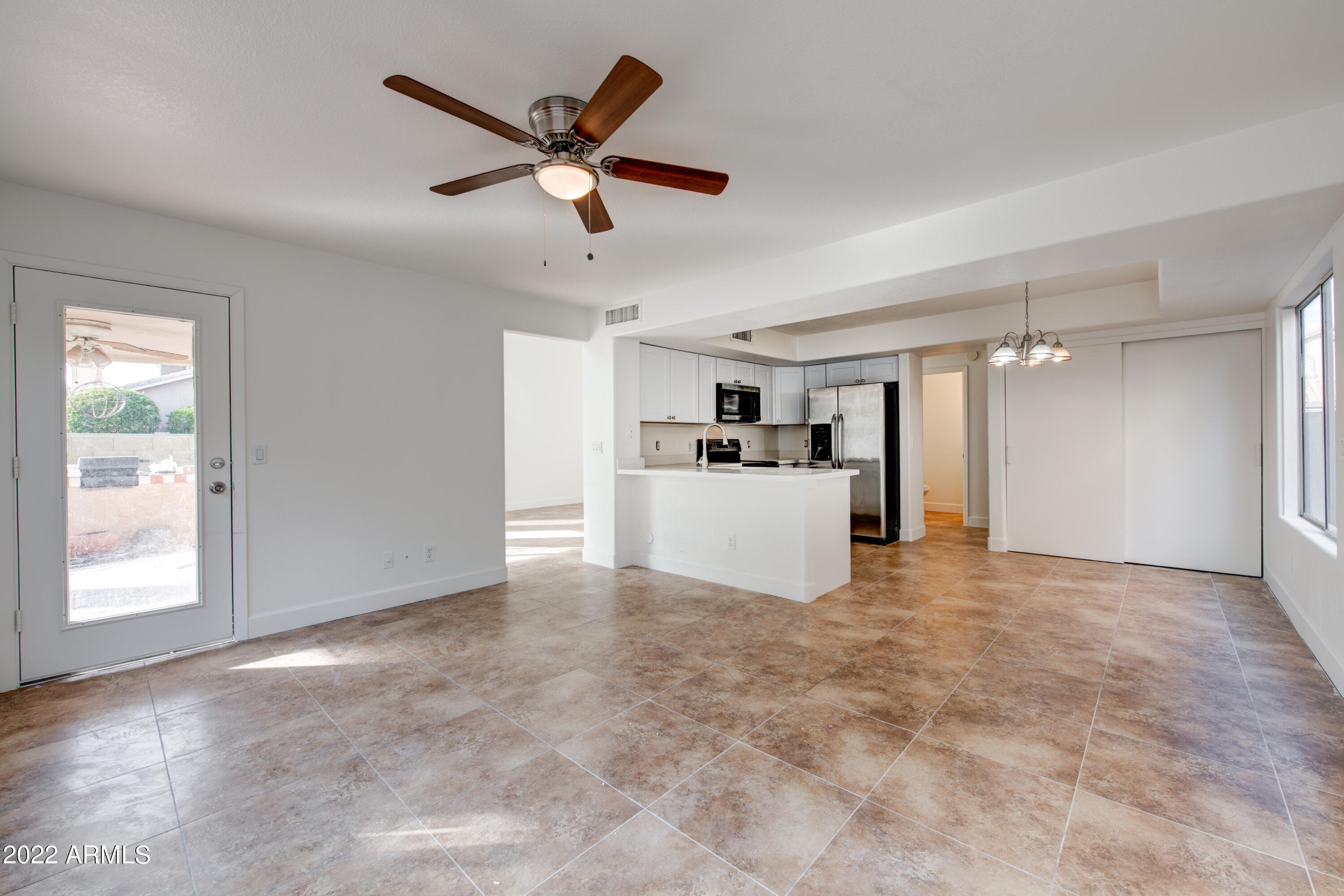 4603 East St John Road Phoenix, AZ 85032 - Photo 3 of 18 Open and Bright Family Room/Kitchen