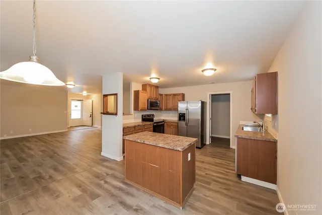 a large kitchen with a lot of counter space