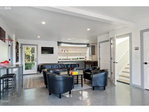 a kitchen with stainless steel appliances granite countertop a stove and a sink