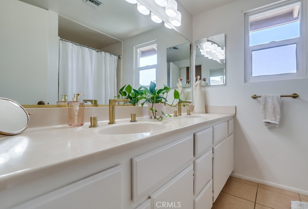 1749 Compromise Line Road Glendora, CA 91740 - Photo 32 of 44 a bathroom with a sink and a mirror