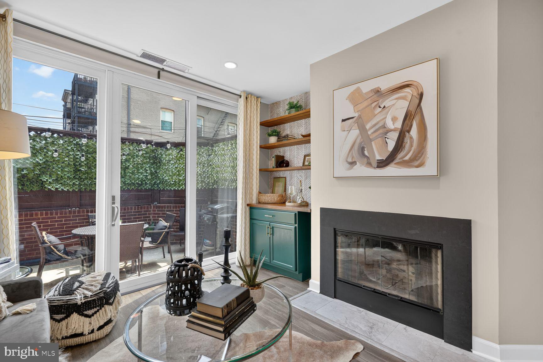 1810 Kalorama Road Northwest, Unit B1 Washington, DC 20009 - Photo 2 of 16 Wood-burning fireplace restored in 2021