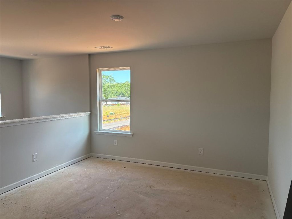129 Cedar Shoals Easley, SC 29640 - Photo 12 of 31 A well-lit upper-level space awaits your personal touches, offering a tranquil outlook.