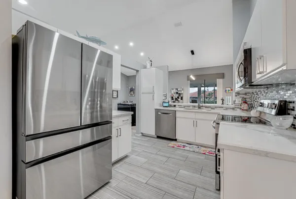 $314,000 | 7023 Summer Tree Drive, Unit 202, Boynton Beach, FL 33437