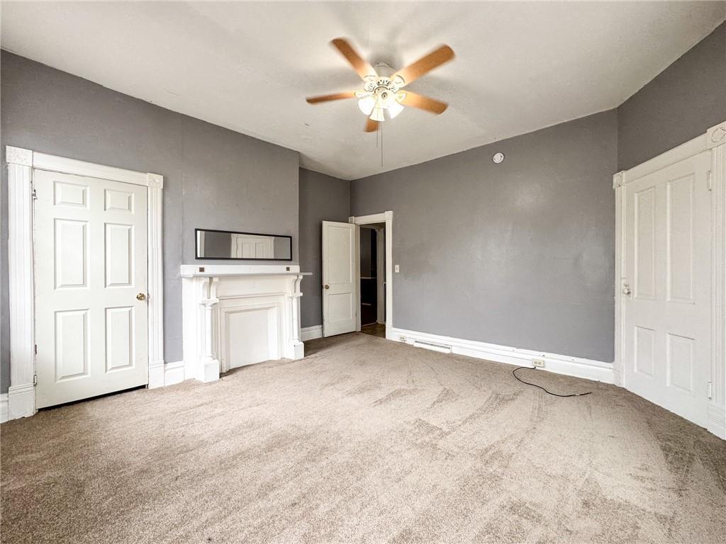 411 Cherry Street, Unit 1 Butler, PA 16001 - Photo 14 of 16 a view of an empty room with a kitchen