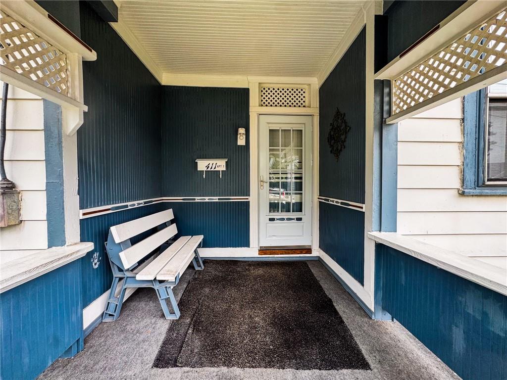 411 Cherry Street, Unit 1 Butler, PA 16001 - Photo 2 of 16 a view of a two chairs in the balcony
