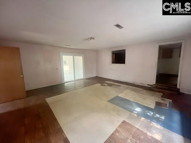 5545 Pisgah Road Rembert, SC 29128 - Photo 22 of 26 a view of empty room with wooden floor and fan