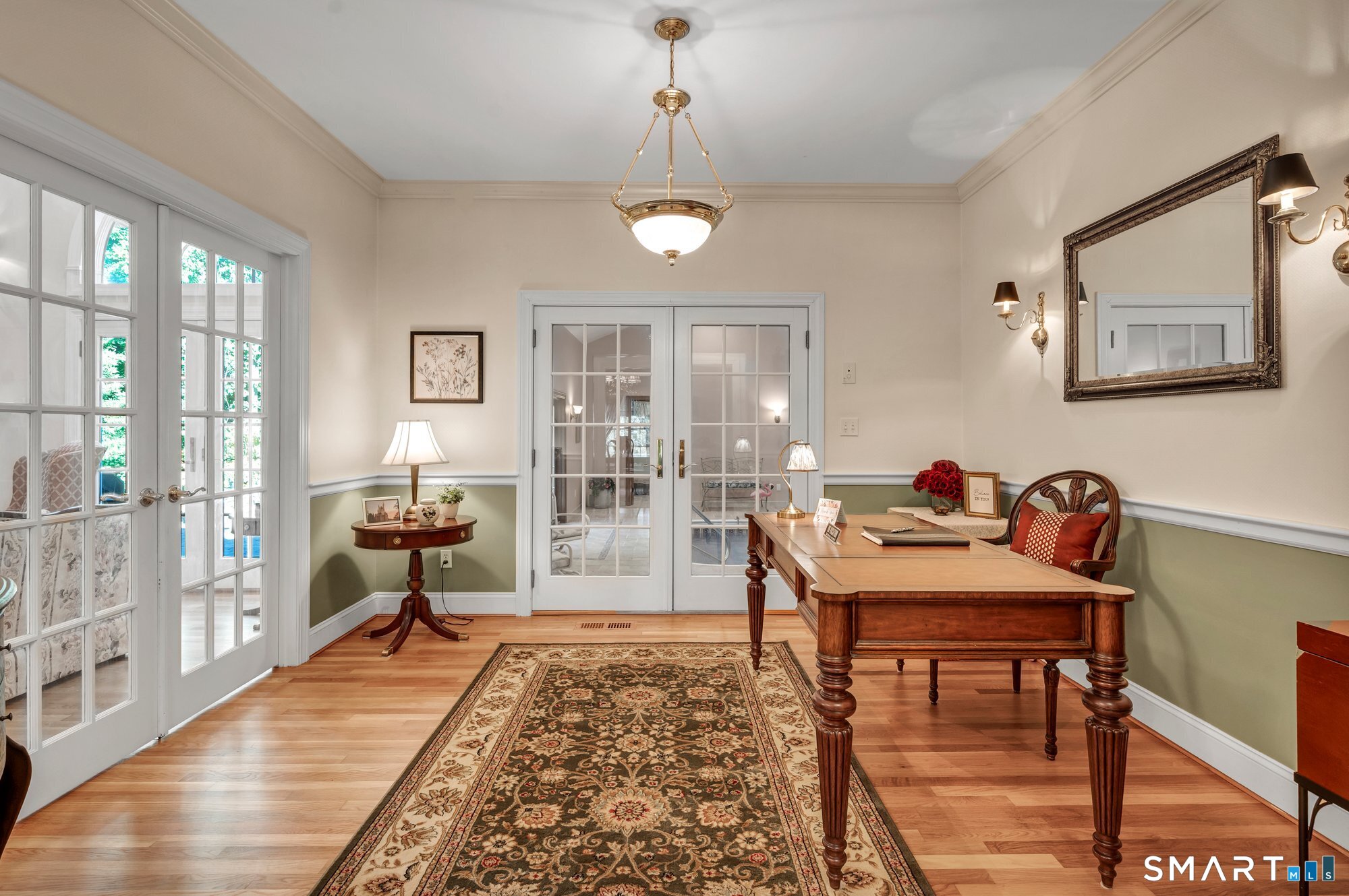 270 Copper Ridge Southington, CT 06489 - Photo 11 of 40 The study features refinished hardwood floors and two sets of French doors-one opening to the indoor pool room and the other to the living room.