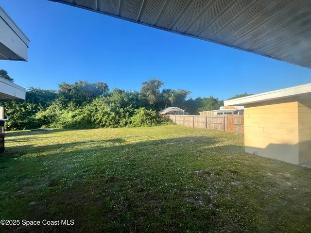 a view of an outdoor space and a yard