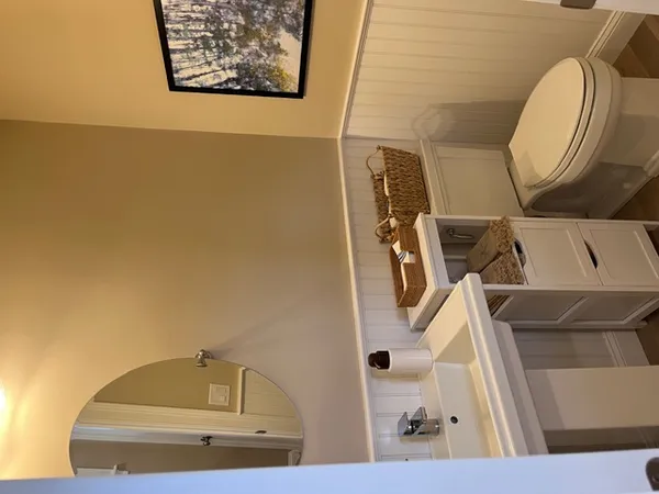 a bathroom with a toilet and a sink