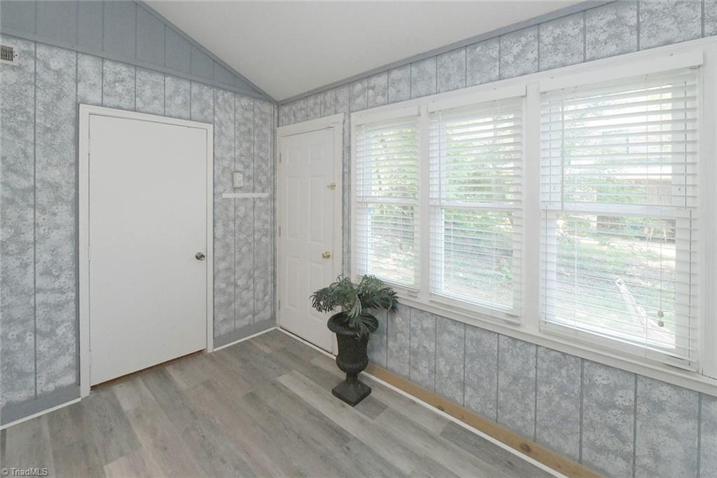 908 South Ridge Court, Unit 128 Winston-Salem, NC 27107 - Photo 16 of 24 Adjoining Sunroom
