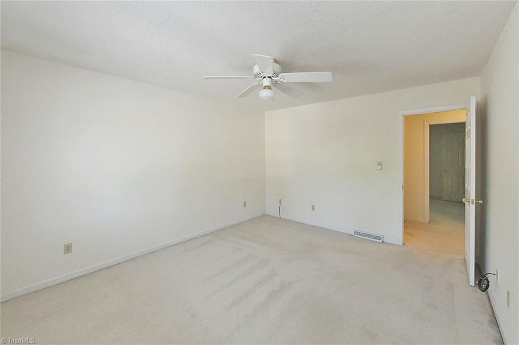 908 South Ridge Court, Unit 128 Winston-Salem, NC 27107 - Photo 20 of 24 Upper Level Primary Bedroom