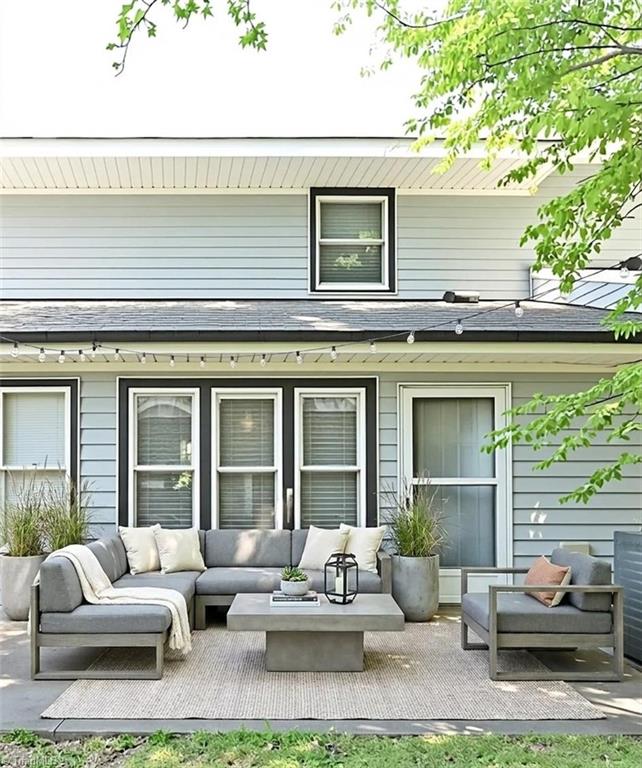 908 South Ridge Court, Unit 128 Winston-Salem, NC 27107 - Photo 3 of 24 Rear Patio - VIRTUAL STAGING