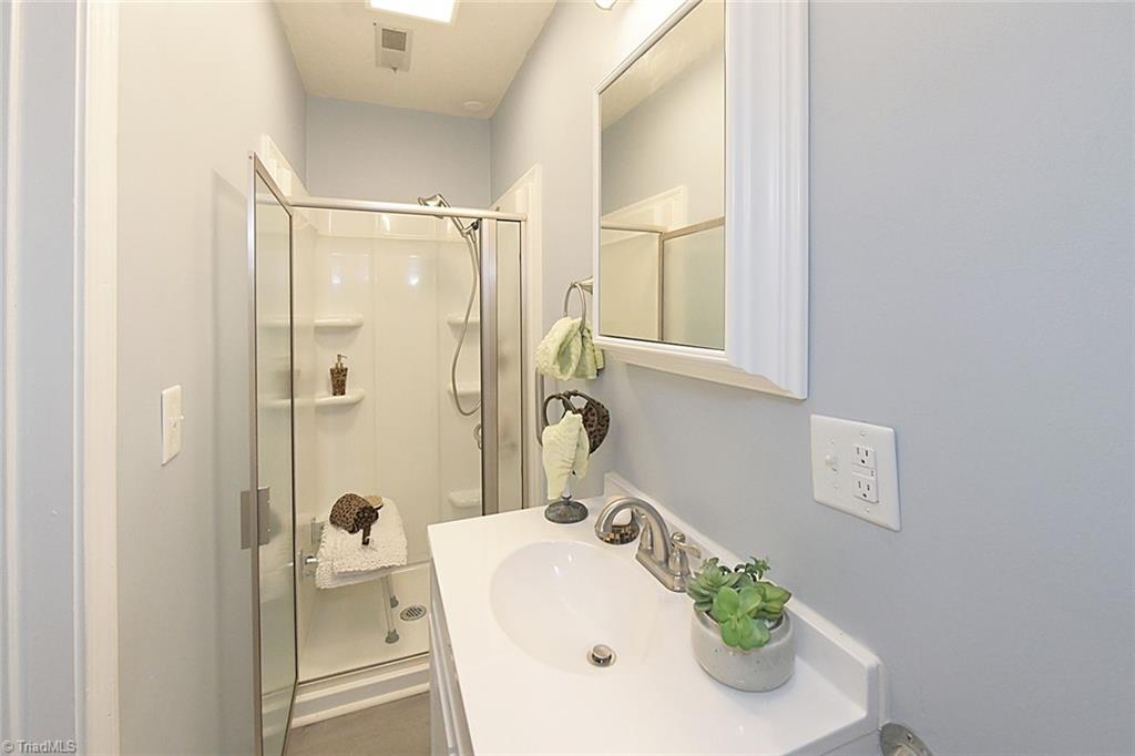 908 South Ridge Court, Unit 128 Winston-Salem, NC 27107 - Photo 8 of 24 Full Bath with Walk-in Shower - Recent Vanity