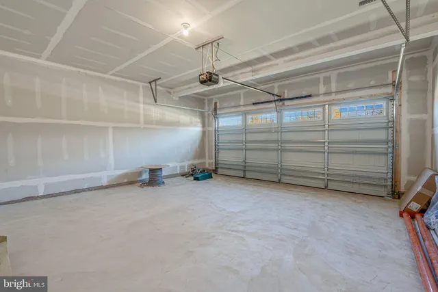 a view of garage with parked