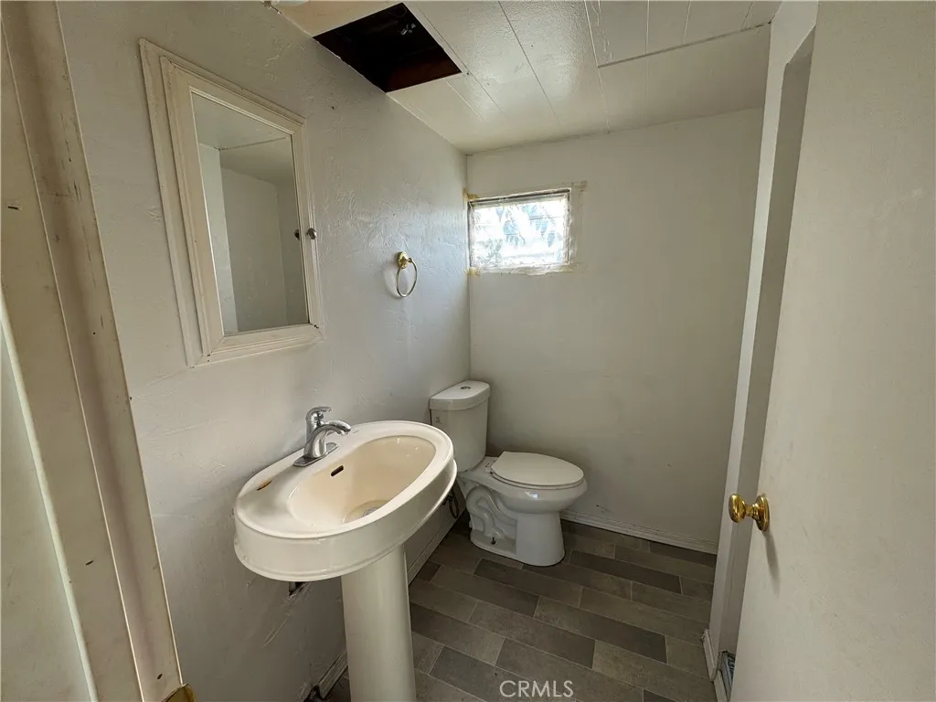 1450 Lake Colusa Ca, Unit 6 Colusa, CA 95932 - Photo 8 of 8 a bathroom with a sink and a toilet