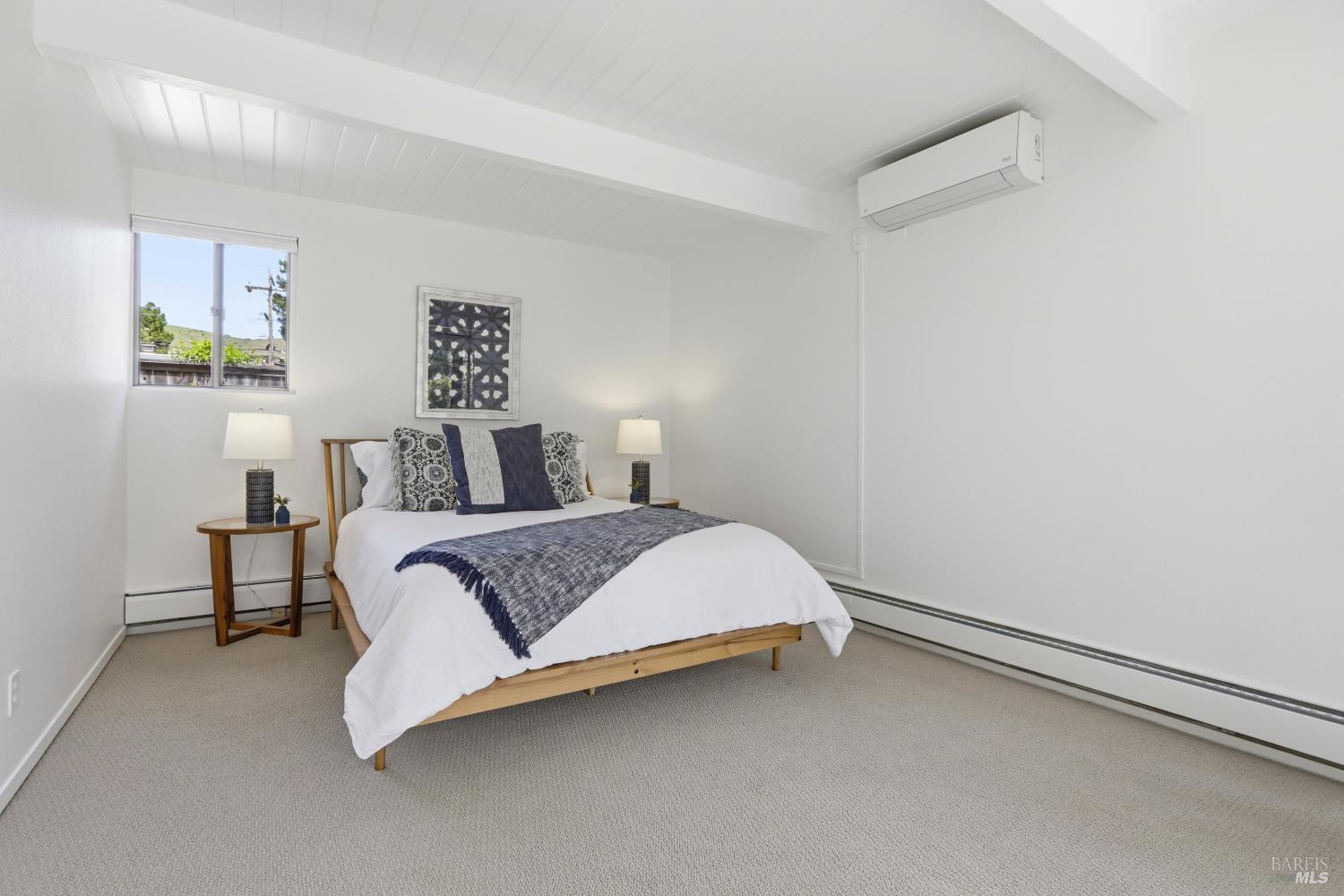 656 Bamboo Terrace San Rafael, CA 94903 - Photo 18 of 26 a bedroom with a bed and window