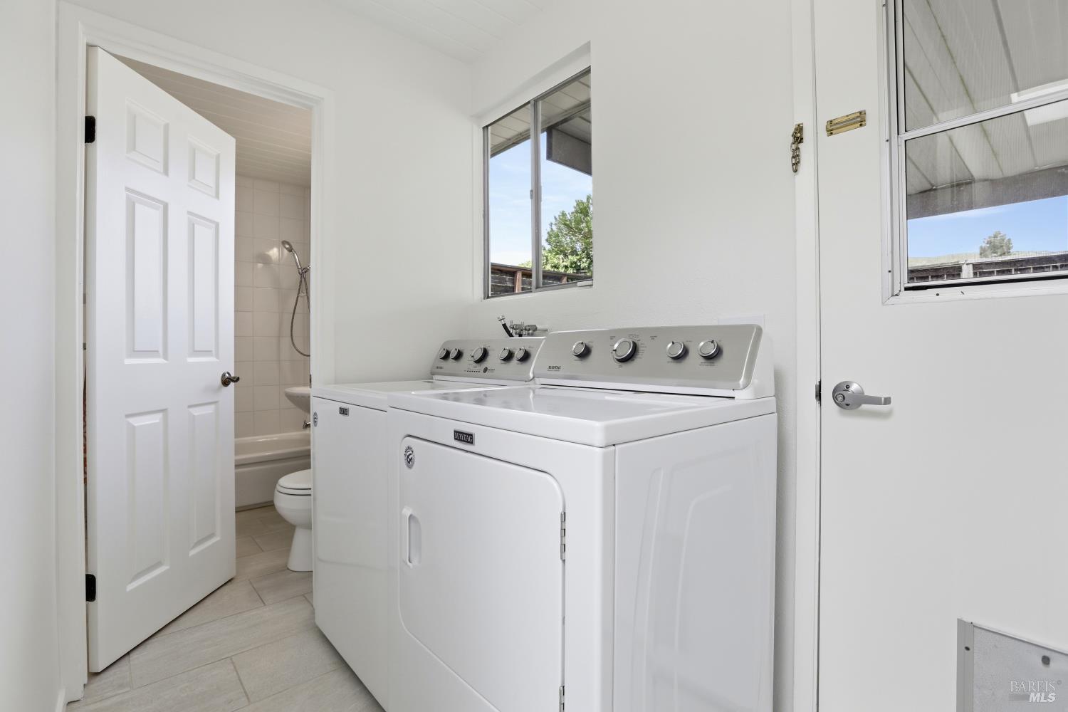656 Bamboo Terrace San Rafael, CA 94903 - Photo 20 of 26 a utility room with dryer and washer