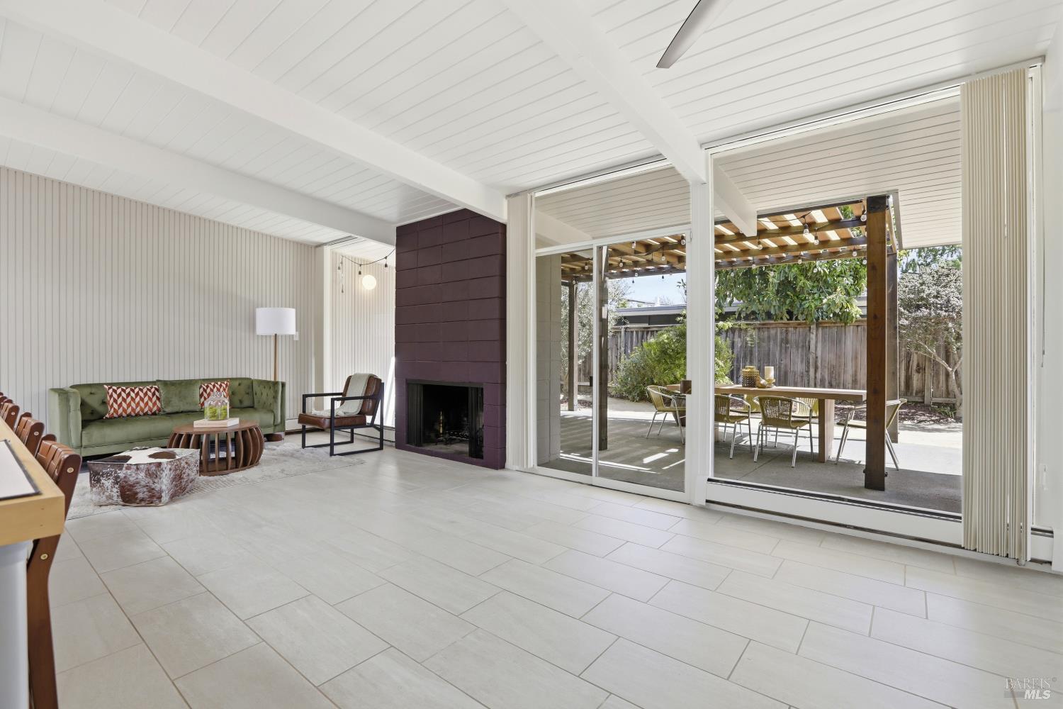 656 Bamboo Terrace San Rafael, CA 94903 - Photo 7 of 26 a view of a livingroom with furniture window and a fireplace
