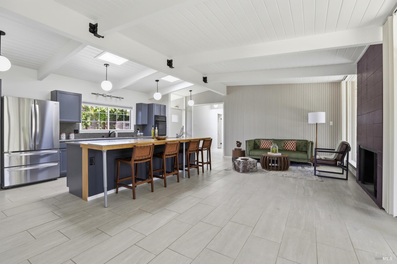 656 Bamboo Terrace San Rafael, CA 94903 - Photo 9 of 26 a kitchen with stainless steel appliances lots of counter top space and furniture