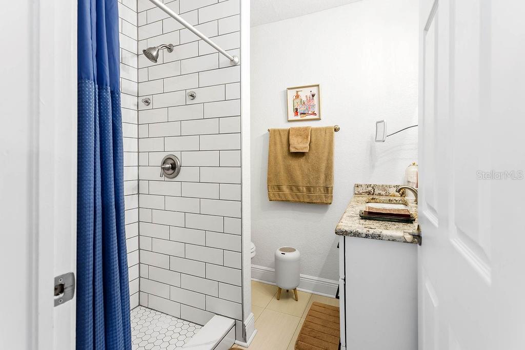 2909 West Dewey Street Tampa, FL 33607 - Photo 13 of 25 a bathroom with a sink and a toilet