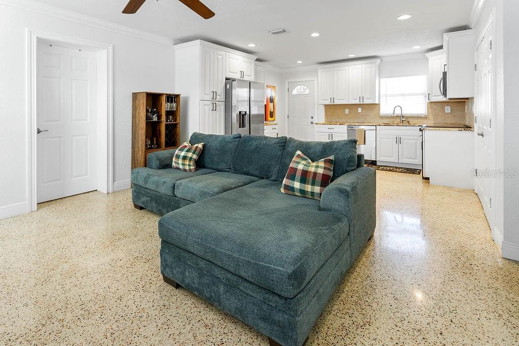 2909 West Dewey Street Tampa, FL 33607 - Photo 5 of 25 a living room with stainless steel appliances granite countertop furniture and a couch
