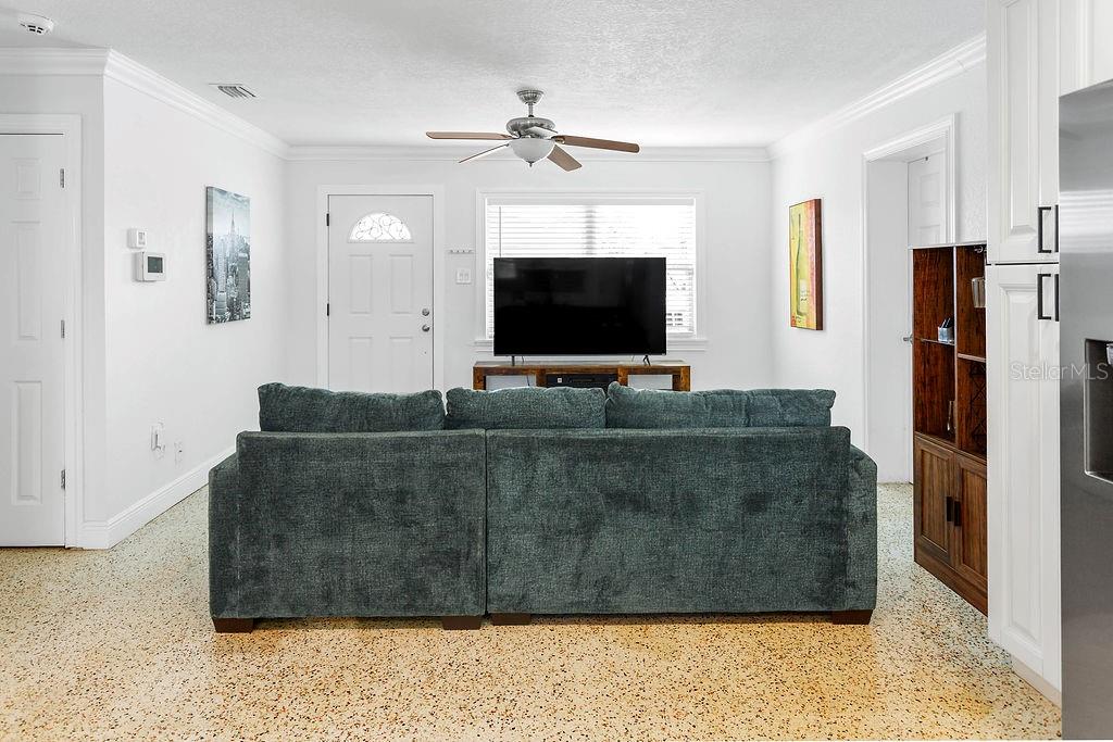 2909 West Dewey Street Tampa, FL 33607 - Photo 6 of 25 a living room with furniture and a flat screen tv