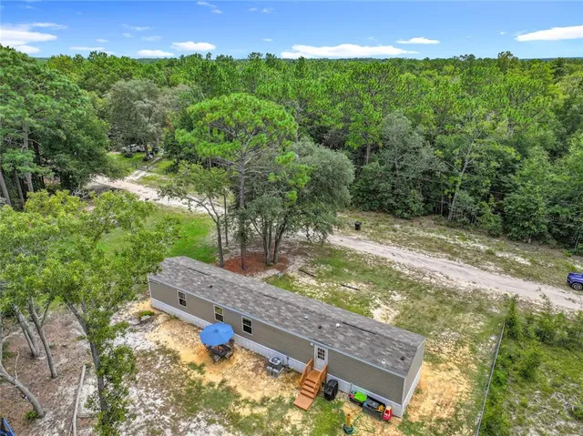 a view of an outdoor space and a yard