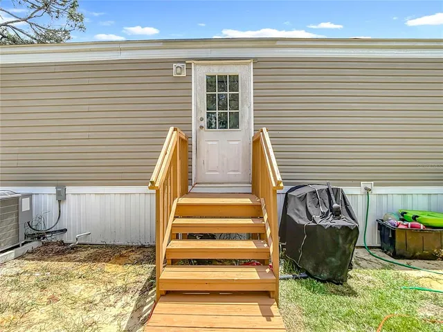 a view of a back yard of the house