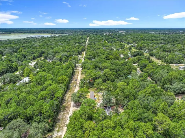 a view of a yard with an outdoor space