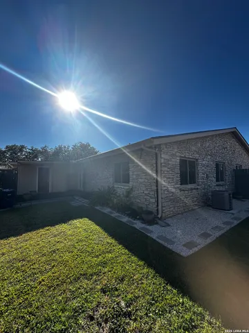a house view with a swimming pool