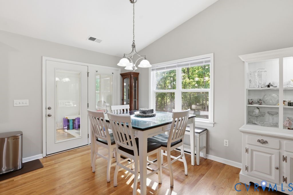5307 St Pauls Church Road Goochland, VA 23063 - Photo 19 of 44 a view of a dining room with furniture window and wooden floor