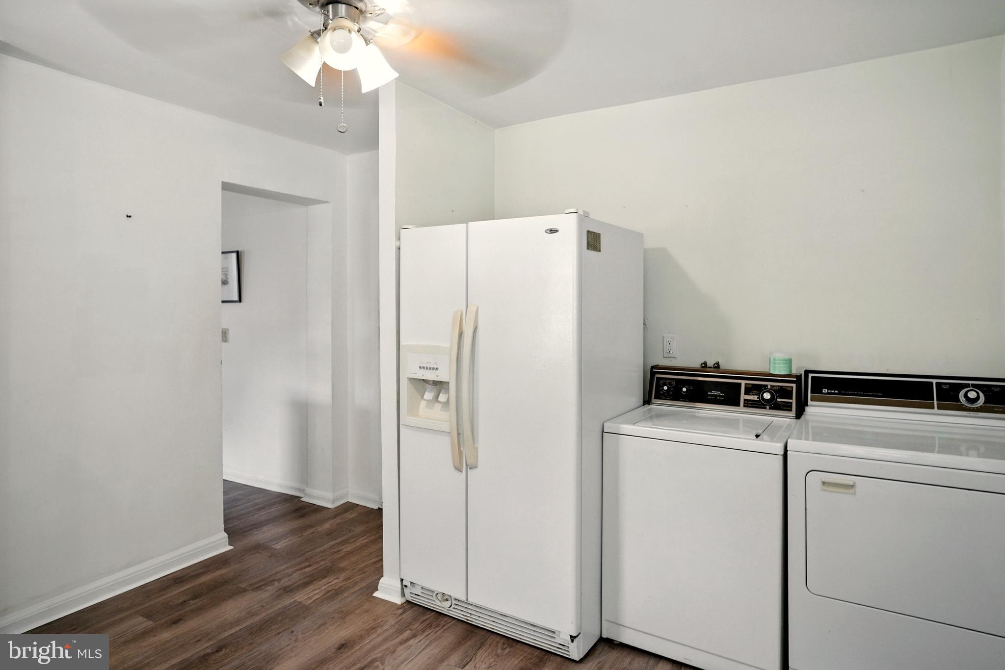 364 South Rolling Road Springfield, PA 19064 - Photo 12 of 37 a white refrigerator freezer sitting inside of a kitchen