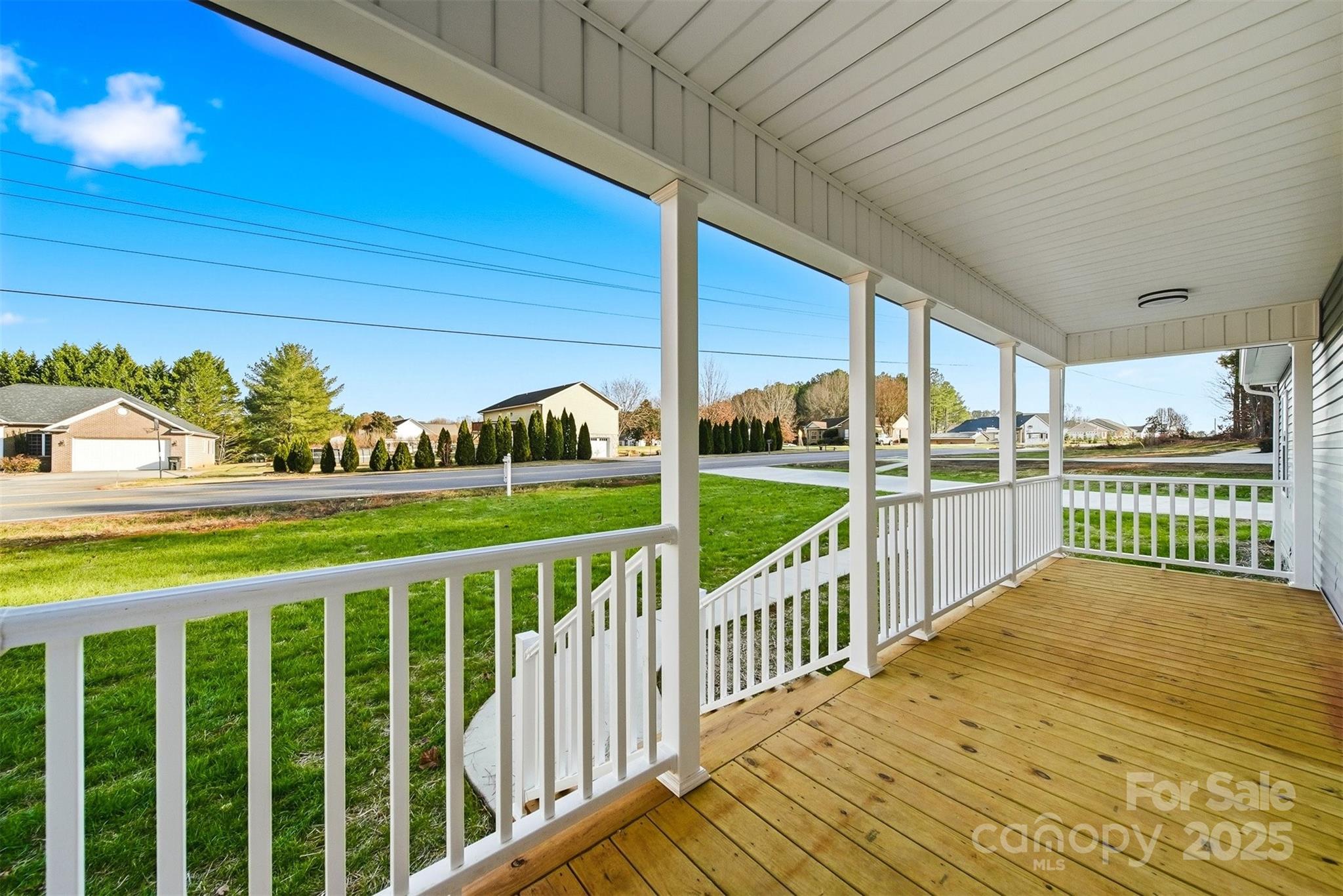 4951 Grace Chapel Road Granite Falls, NC 28630 - Photo 33 of 38 a view of a porch with wooden floor and fence