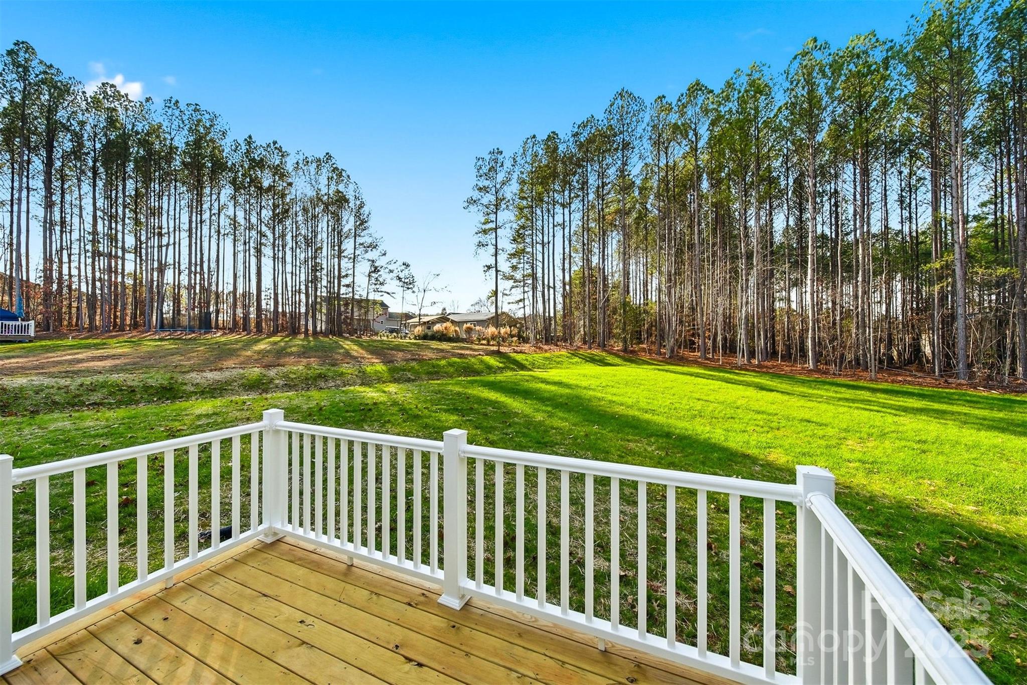 4951 Grace Chapel Road Granite Falls, NC 28630 - Photo 35 of 38 a view of a wooden deck with a backyard