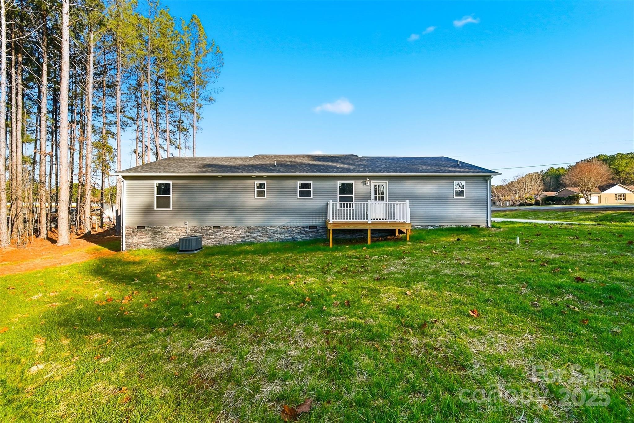 4951 Grace Chapel Road Granite Falls, NC 28630 - Photo 36 of 38 a view of house with backyard and garden