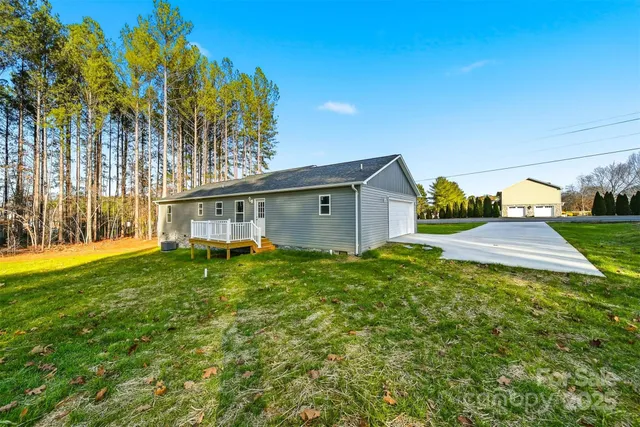a view of swimming pool with an outdoor space and seating area