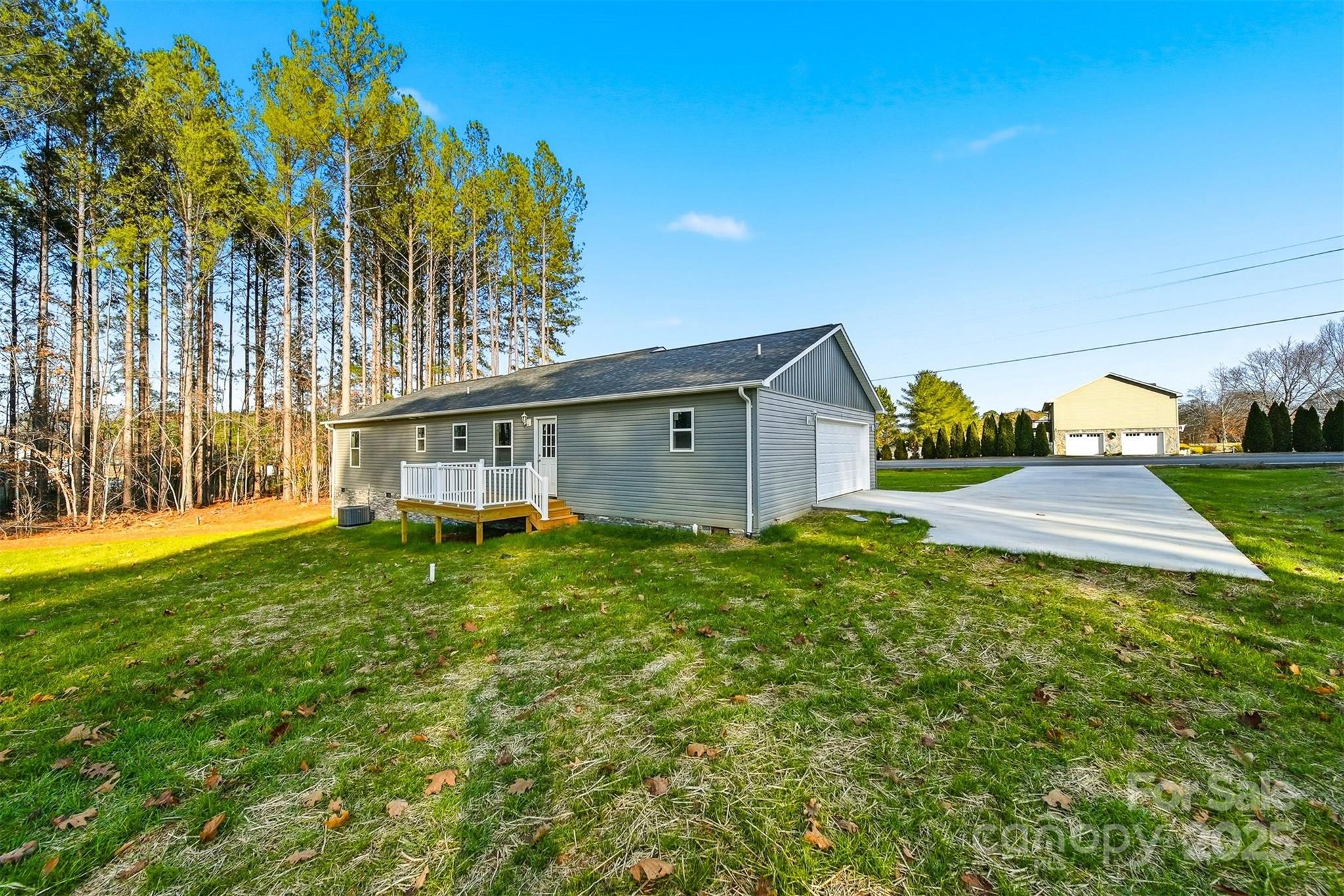 4951 Grace Chapel Road Granite Falls, NC 28630 - Photo 37 of 38 a view of a house with a backyard