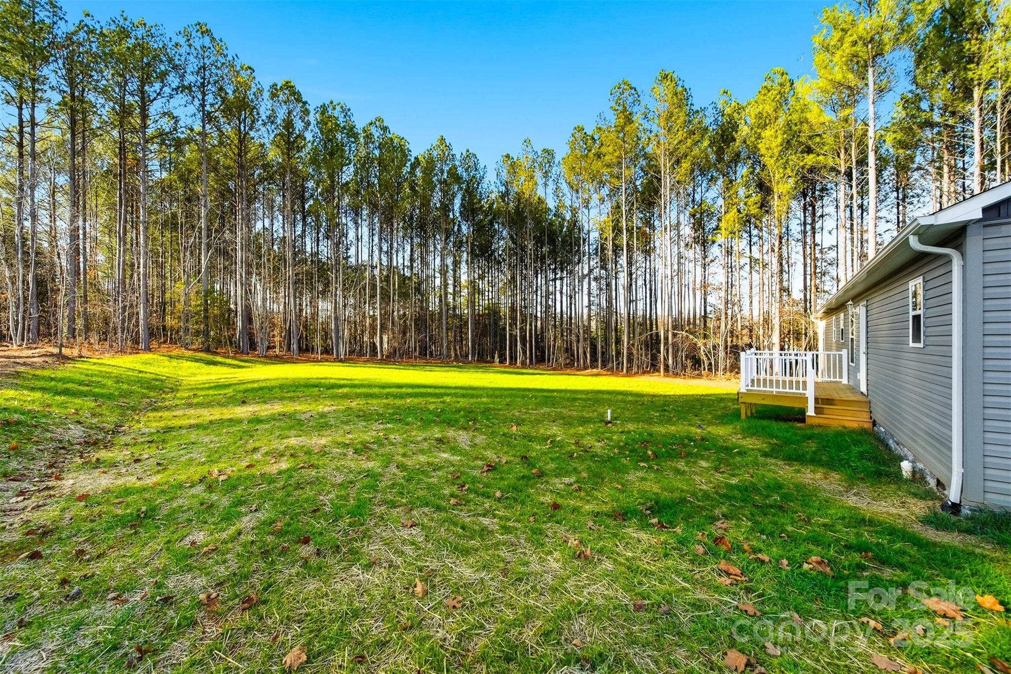 4951 Grace Chapel Road Granite Falls, NC 28630 - Photo 38 of 38 a view of swimming pool with an outdoor space and seating area