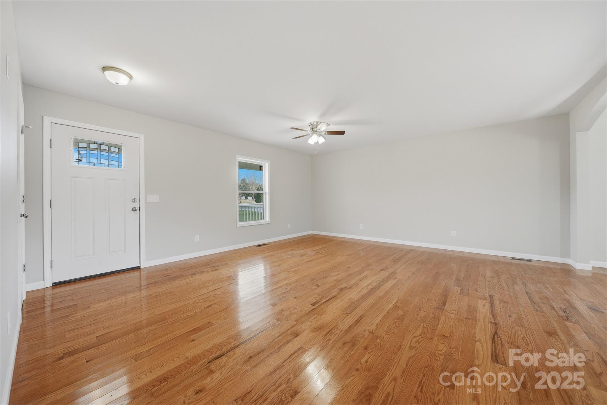 4951 Grace Chapel Road Granite Falls, NC 28630 - Photo 4 of 38 wooden floor in an empty room