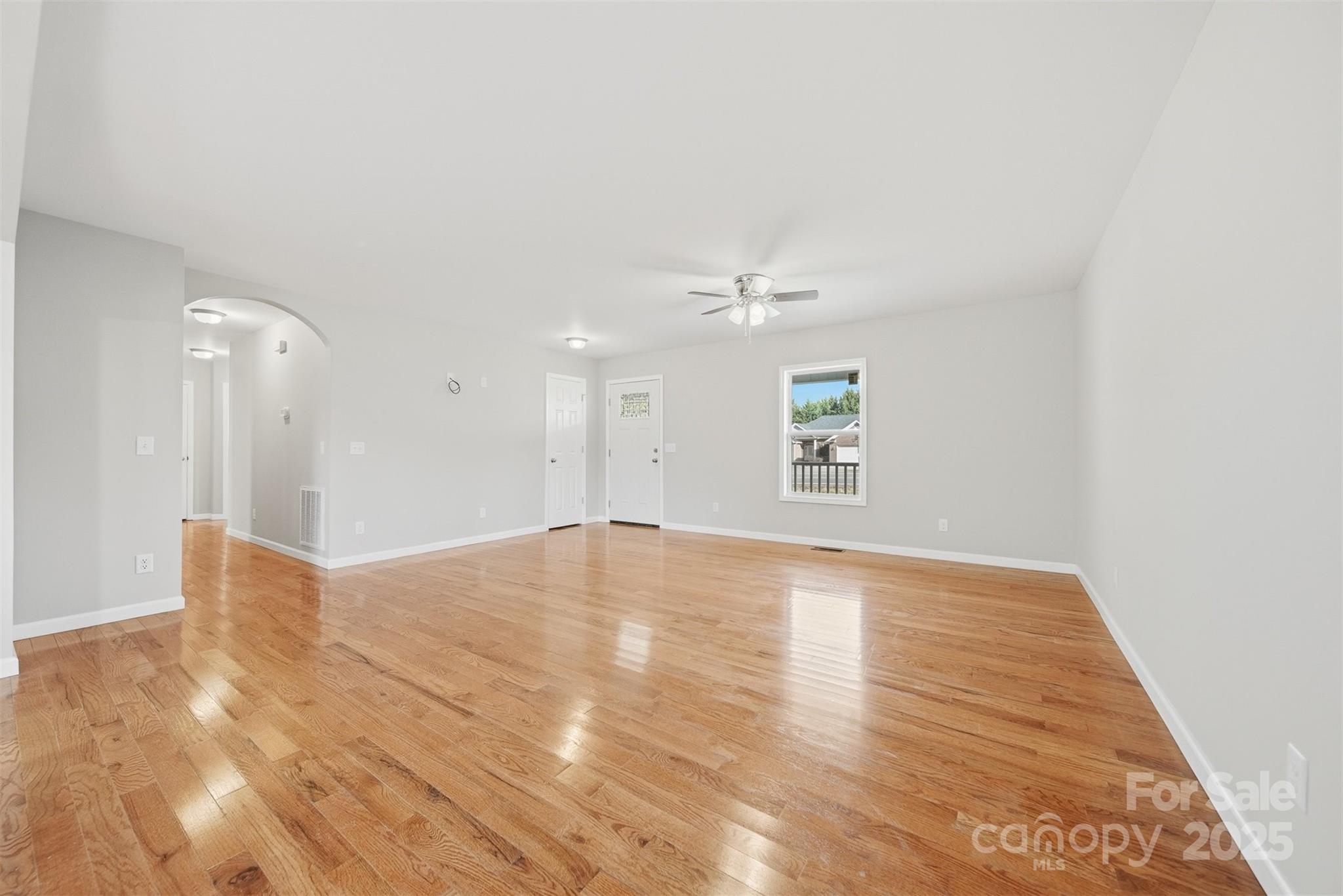 4951 Grace Chapel Road Granite Falls, NC 28630 - Photo 5 of 38 a view of empty room with wooden floor
