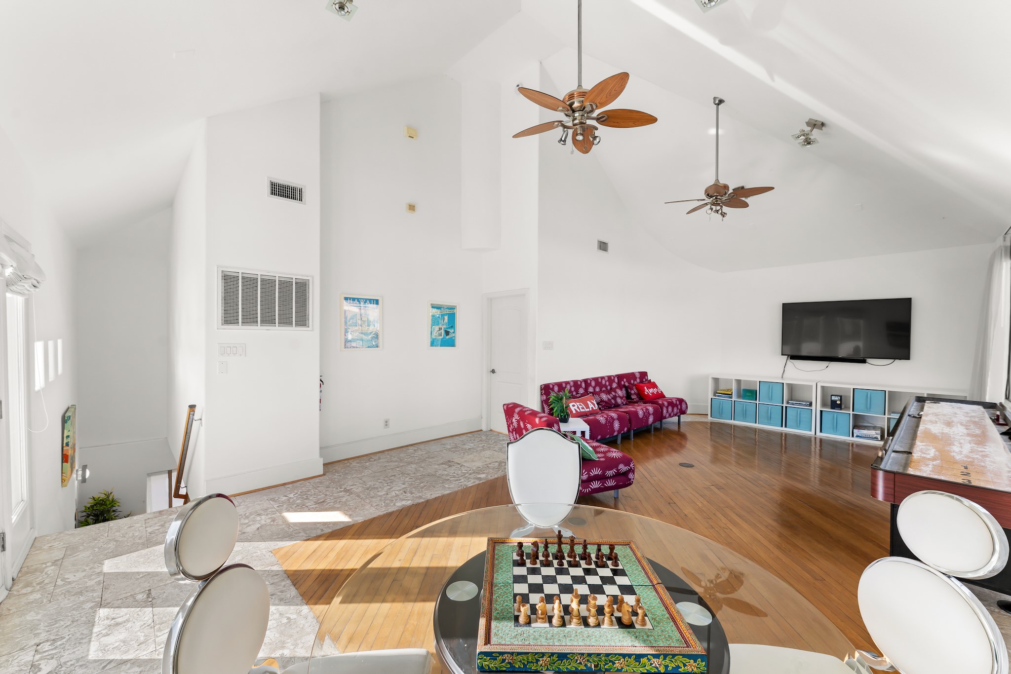 315 Fairview Street, Unit A Houston, TX 77006 - Photo 14 of 35 a living room with furniture and a flat screen tv