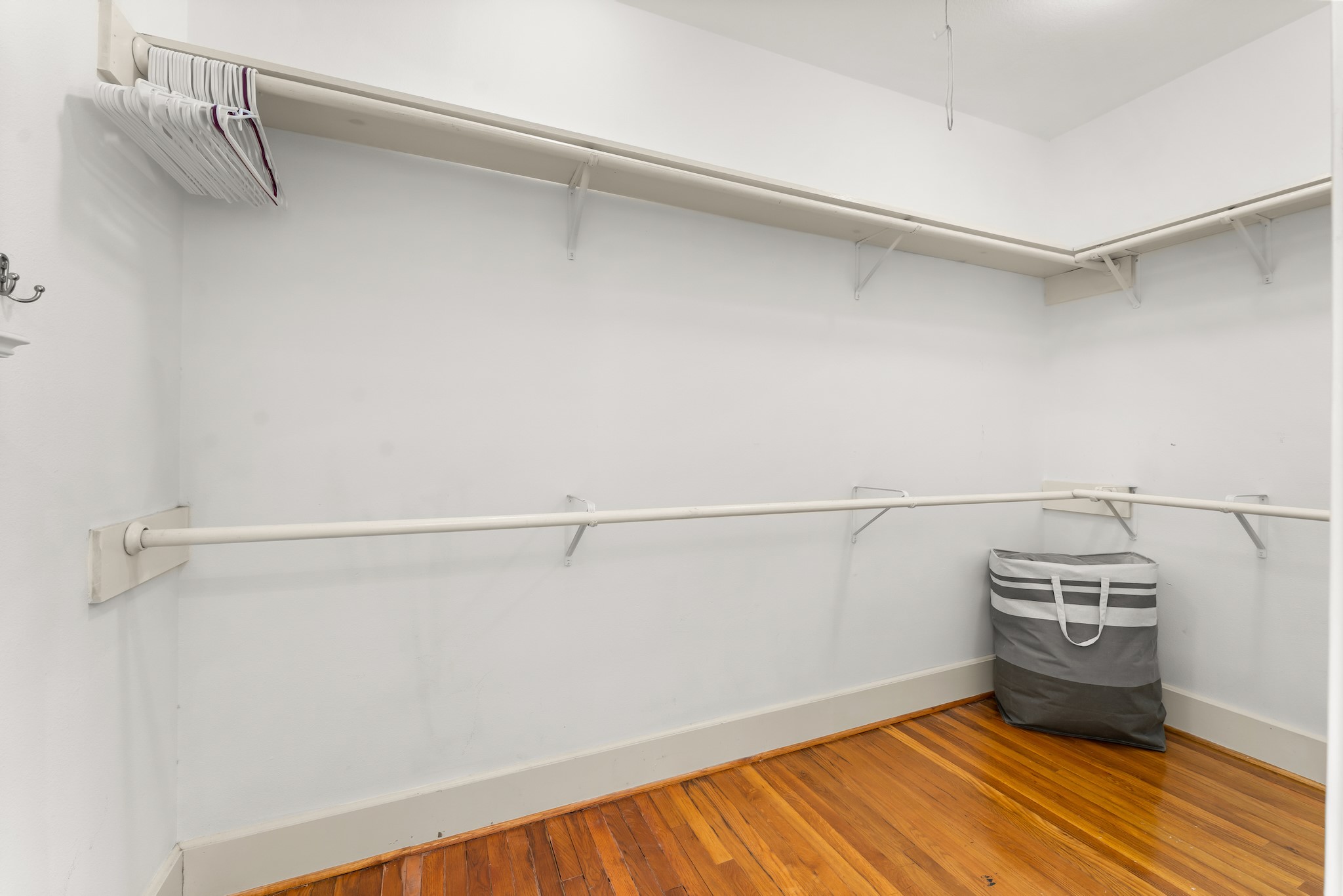 315 Fairview Street, Unit A Houston, TX 77006 - Photo 22 of 35 a view of a room with racks on the wall