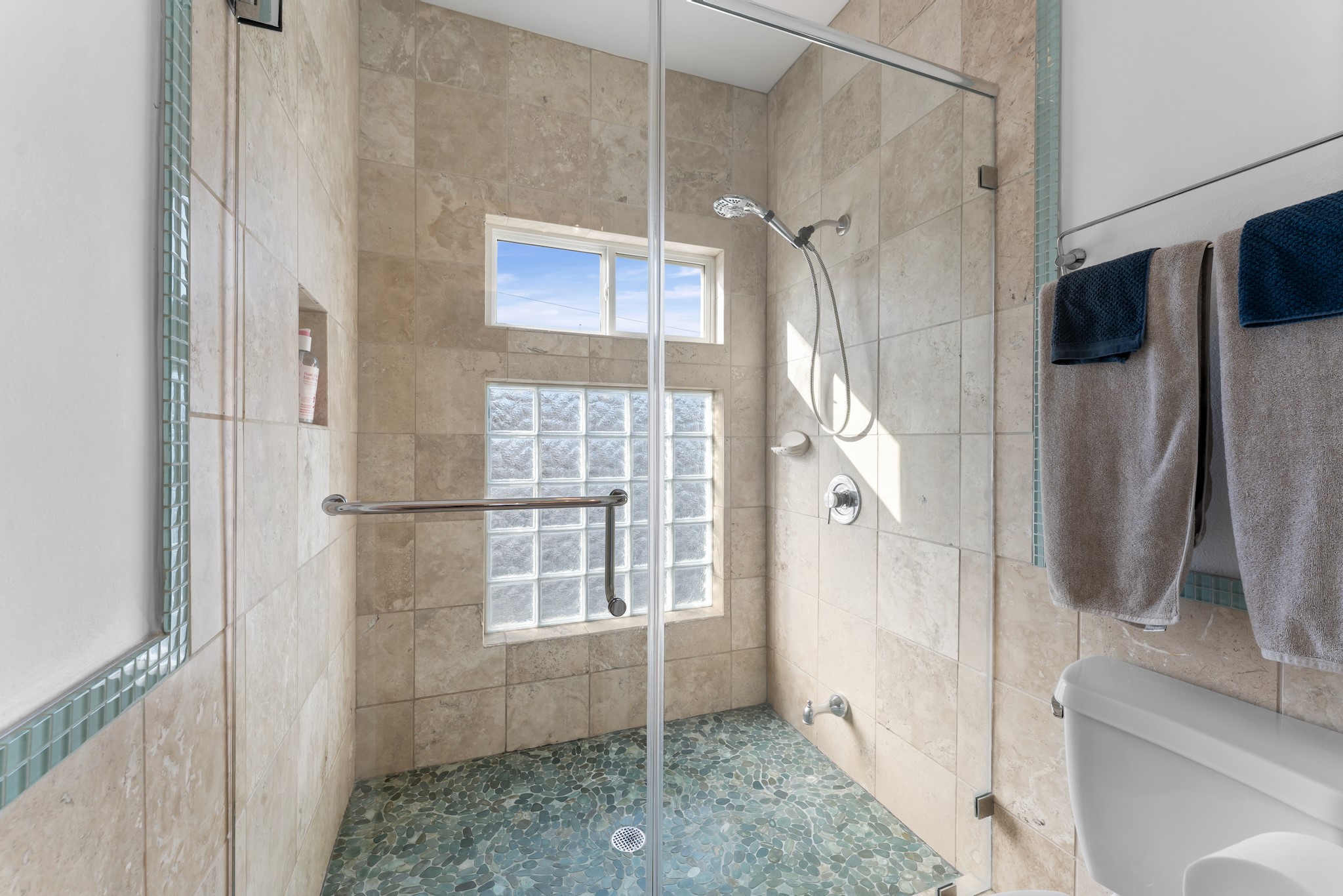 315 Fairview Street, Unit A Houston, TX 77006 - Photo 23 of 35 a bathroom with a shower and a mirror