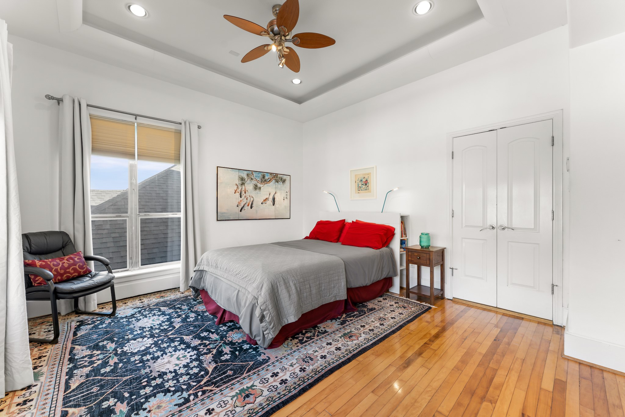 315 Fairview Street, Unit A Houston, TX 77006 - Photo 25 of 35 a bedroom with a bed dresser and a window
